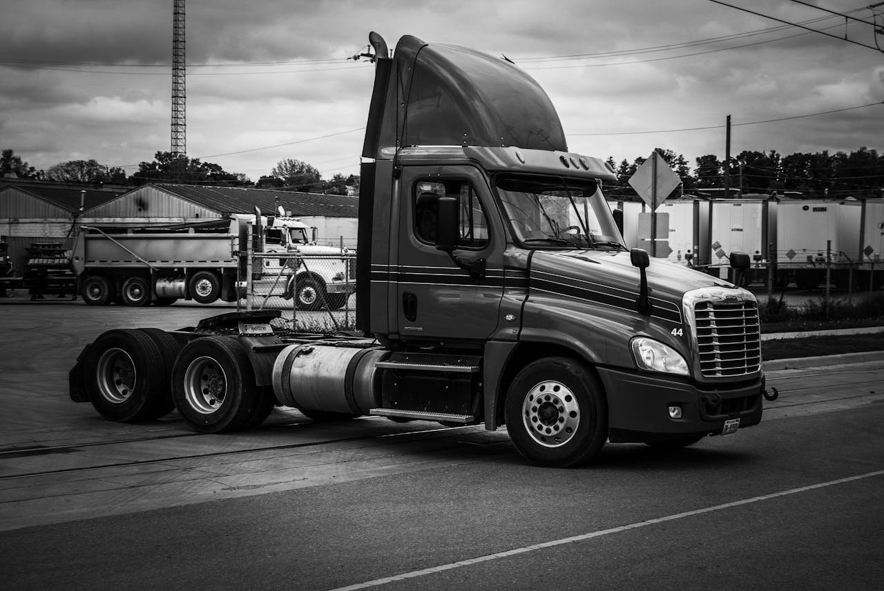 Monochrome image of a semi truck parked in an industrial area in Kitchener, Canada.